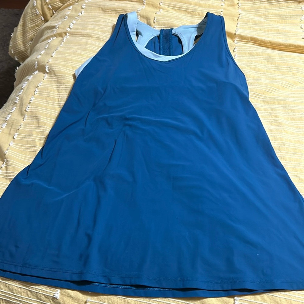 Lululemon top with built in bra.  The color is teal and light blue